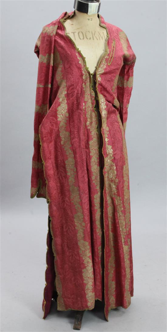 A Turkish brocade red ground robe and a Chinese purple ground rug(-)